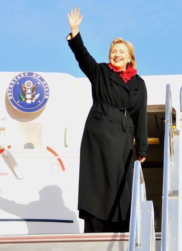 Secretary of State Hillary Clinton waves Feb. 18 during her trip to Asia.