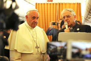 Pope Francis and Father Federico Lombardi speaking to reporters on the papal plane to Armenia, June 24, 2016