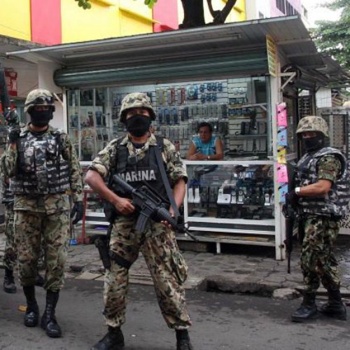 Mexican Marines participate in a raid in July 2012 targeting members of  the Los Zetas drug cartel.