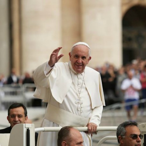 Pope Francis waves during the general audience in St. Peter's Square on Oct. 7. 
