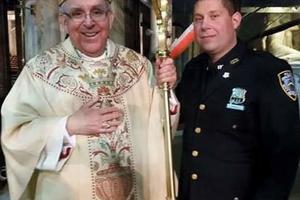 Officer Charlie Carroll with Bishop John O'Hara, auxiliary bishop of the Archdiocese of New York.


