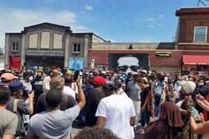 Faith leaders pray June 2 at the spot where George Floyd died. 
