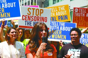 Lila Rose of Live Action, shown speaking during the ‘March on the Media’ in Washington on Aug. 9, 2013, says that as a new mother herself she is ‘more committed than ever’ to fighting for all of the tiny lives in the womb. 