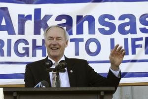 Arkansas Gov. Asa Hutchinson, shown speaking at a pro-life rally at the Arkansas State Capitol in Little Rock, signed legislation March 29 making Arkansas the eighth state in the country to ban sex-selective abortions. Arkansas Gov. Asa Hutchinson, shown speaking at a pro-life rally at the Arkansas State Capitol in Little Rock, signed legislation March 29 making Arkansas the eighth state in the country to ban sex-selective abortions.
