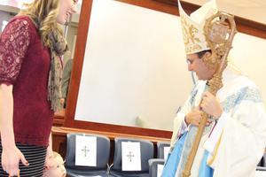 The Ave Maria Academy chapel dedication brought families out for prayer.