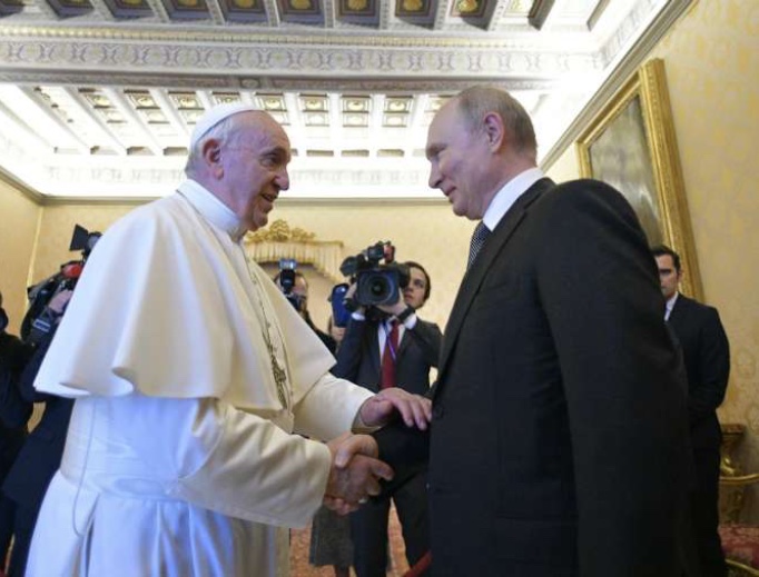 Pope Francis greets Russian President Vladimir July 4, 2019, at the Vatican. 