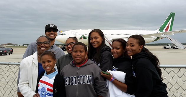 Troy Hill, Shirley Austin and children from Holy Comforter - St. Cyprian Catholic Church in Washington ready to greet Pope Francis on his first steps onto United States soil.