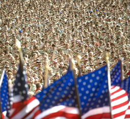 Boy Scouts of America salute the flag during the 2010 National Scout Jamboree on Fort AP Hill, Va.
