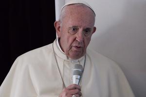 Pope Francis answers journalists’ questions, aboard the papal plane returning to Rome following his three-day visit to the United Arab Emirates.