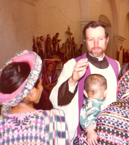 Father Stanley Rother blesses a baby and celebrates Mass in Guatemala.