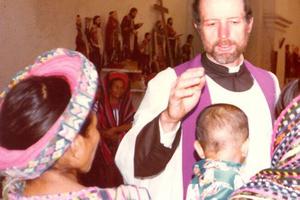 Father Stanley Rother blesses a baby and celebrates Mass in Guatemala.