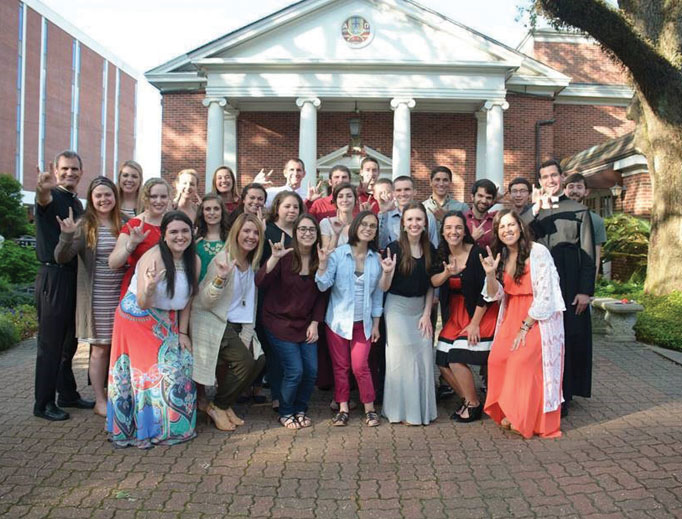 University of Louisiana at Lafayette students and priests at Our Lady of Wisdom Church and Catholic Student Center.