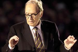 Ennio Morricone conducts an orchestra in the Paul VI Audience Hall at a concert on Nov. 12, 2016, at the Vatican.