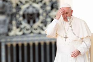 Pope Francis makes the Sign of the Cross April 18.