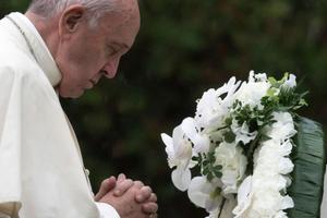 Pope Francis prays after laying a wreath at the Hypocenter Cenotaph at the Atomic Bomb Hypocenter Park on Nov. 24 in Nagasaki, Japan. 