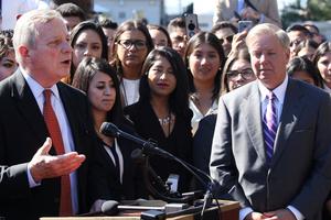 Sen. Dick Durbin, D-Ill. (l), and Sen. Lindsey Graham, R-S.C., participate in a news conference with more than 100 recipients of the ‘Deferred Action for Childhood Arrival’ program — also known as ‘DACA’ — to call on the Senate to support the ‘Dream Act’ on Capitol Hill Oct. 4, 2017, in Washington, D.C. Debate continues on DACA in the wake of the January government shutdown

