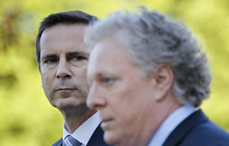 INTERVENTIONISTS? A Quebec judge ruled recently that a Catholic high school in Montreal could opt out of a government "Ethics and Religious Culture" curriculum. Quebec Premier Jean Charest, in foreground, promised to appeal a ruling. And in Ontario, the Liberal government, led by Premier Dalton McGuinty, left, withdrew a controversial sex education curriculum after outcries from religious leaders. Both cases are being seen as evidence of a restoration of Christian values in Canada.