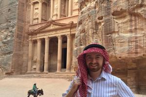 Above, Peter Jesserer Smith in front of the Treasury of Petra. Below, the Dead Sea at sunset, the baptismal site of Jesus, the Christian proprietors of Beit Sitti, with one of their Muslim cooks, and Machereus.