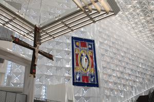 Catholic elements are the hallmark of the renovation, from the large crucifix to window shades and baptismal font.