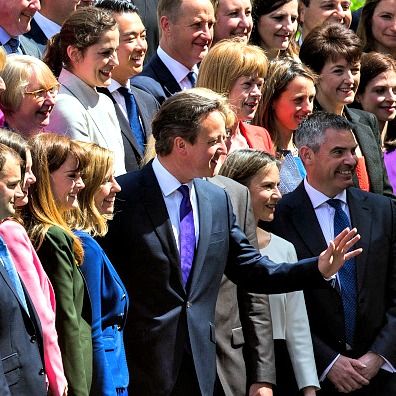 British Prime Minister David Cameron (c) poses for a picture with the new Conservative Party MPs in Palace Yard on May 11 in London.