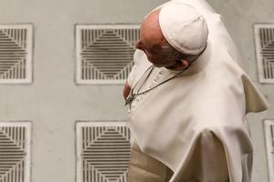 Pope Francis attends the Wednesday general audience in the Vatican's Paul VI Hall on Feb. 6. 