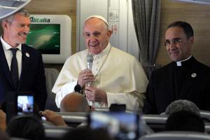 Pope Francis speaks during a press conference with journalist aboard the papal flight from Rome to Maputo, Mozambique, Sept. 4, 2019.
