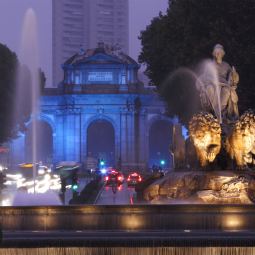 Puerta de Alcala, the symbolic main entrance to the city of Madrid, is lit in blue in this evening view from Plaza de Cibeles in Madrid, Spain, Nov. 14. Youths from around the world will join Pope Benedict XVI when he enters Madrid through the archways f or an evening reception during World Youth Day Aug. 16-21.