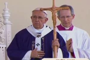 Pope Francis at border Mass on Feb. 17. He is using cross crafted by Juarez prisoners.