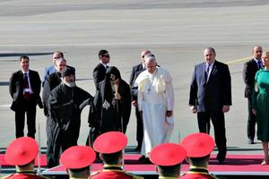 Pope Francis arrives at the Tbilisi airport in Georgia Sept. 30.