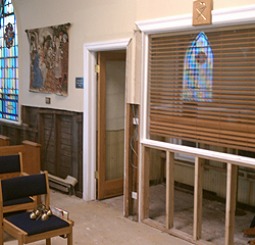 Repairs to the walls of St. Virgilius Catholic Church in Queens, N.Y.