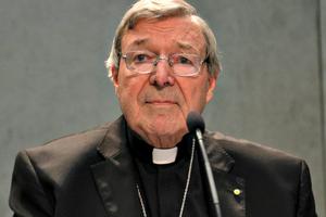 Cardinal George Pell holds a news conference at the Vatican, June 29. The cardinal said he will return to Australia to defend himself against sexual assault charges. 