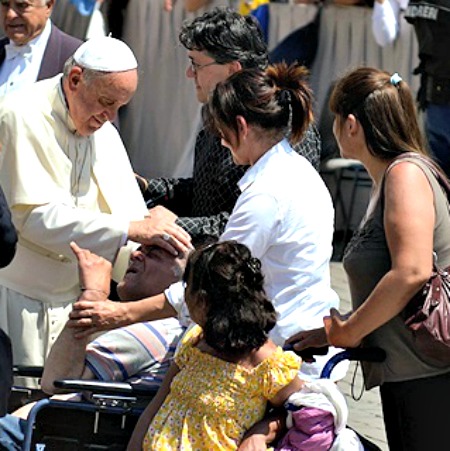 Pope Francis greets pilgrims in St. Peter's Square May 21.


