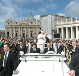 Pope Francis waves to the crowd at his April 3 general audience.