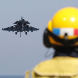 MISSION OVER LIBYA. A Rafale fighter jet returning from a mission prepares to land on the deck of France’s Charles de Gaulle aircraft carrier March 27. The Charles de Gaulle continued to run against targets in Libya to enforce NATO’s no-fly zone. 