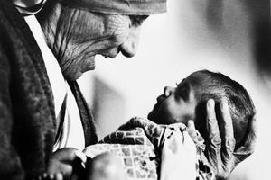 Mother Teresa cradles an armless baby girl at a Missionaries of Charity orphanage in Kolkata, India, in 1978. A champion among the poorest of the poor, Mother Teresa will be canonized Sept. 4 at the Vatican.  