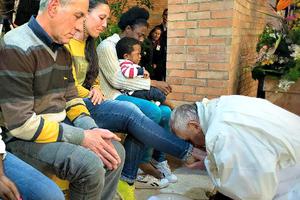 Pope Francis washes the feet of detainees and inmates at the Rebibbia Prison off of the Via Tiburtina in Rome on Holy Thursday, April 2, 2015.
