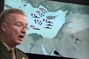 U.S. Marine Lt. Gen. Kenneth F. McKenzie Jr. speaks during a news briefing at the Pentagon April 14 in Arlington, Virginia. The Pentagon held a briefing on the latest development of the strike in Syria. 

