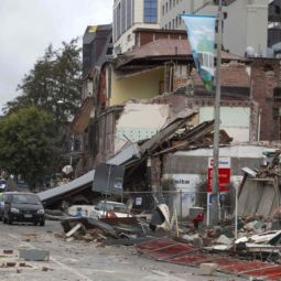 Debris is seen on a street after an earthquake in Christchurch, New Zealand, Feb 22. Dozens of people died when the strong quake toppled churches and numerous buildings in New Zealand’s second-largest city. The historic Catholic Cathedral of the Blessed Sacrament also was badly damaged.