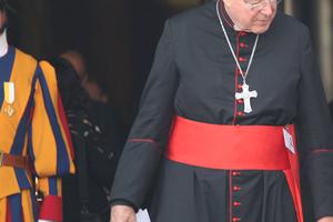 Cardinal George Pell leaves the Vatican's Synod Hall after a session of the synod on the family on Oct. 13, 2014.