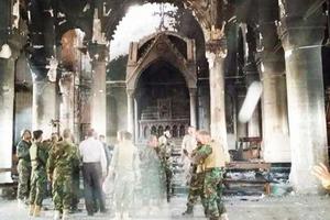 Pershmerga fighters inspect Al Tamera Syriac Catholic parish in Qaraqosh, Iraq, after the city’s recent liberation from the Islamic State.