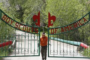 Mark Veteto, Camp Ranger for the Maple Dell Scout Camp, owned by the Utah National Park Council of the Boy Scouts of America, closes the front gate for the day on May 9, 2018 outside Payson, Utah.