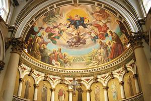 The ornate dome draws eyes upward in the first Catholic church built in New England by Italian immigrants. Marian and saints’ images decorate the sanctuary. 
