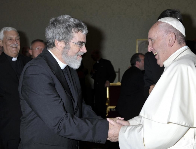 Jesuit Brother Guy Consolmagno greets Pope Francis.