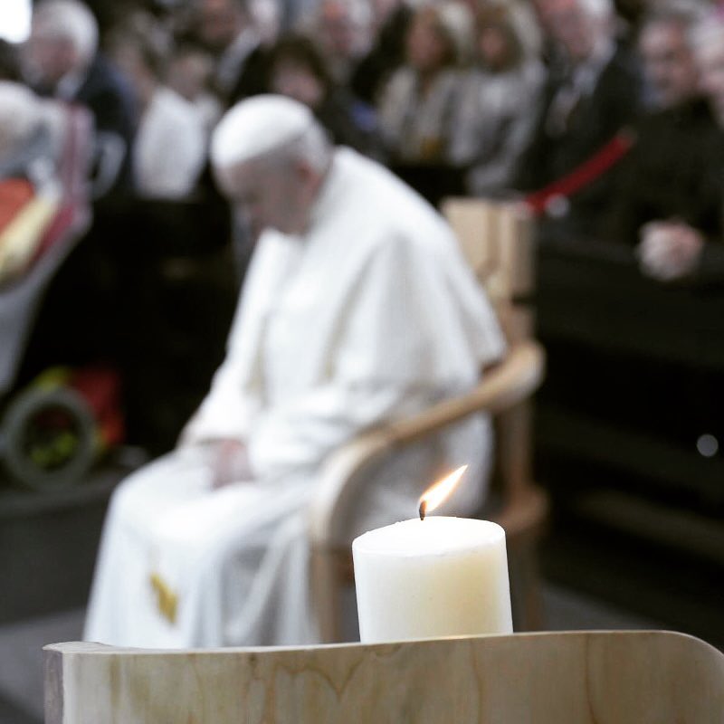 Pope Francis prays at the Knock Shrine in Ireland. There, he asked forgiveness for the sins of abuse in the Church and prayed for victims.