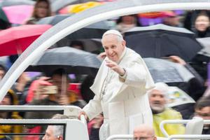 Pope Francis waves at the general audience, April 10, 2019. 