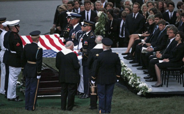 Cardinal McCarrick addresses Kennedy family members during the burial service for Sen. Edward Kennedy.