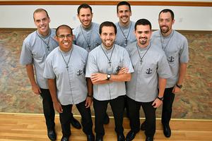 Front row (left to right): Br. Ray Morris, Br. Brandt Haglund, and Br. Martin Buganski. Back row (left to right): Br. Patrick Stucker, Br. Matthew Warnez, Br. Austin Riordan, and Br. Logan Murray.