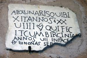 Ancient Christian funerary plaque in Santa Maria degli Angeli, Rome, Italy, for a man named Apollinaris, who lived 29 years, 7 of which with his wife Virginia.