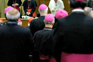 Pope Francis prays as he opens the morning session of the synod on the family Oct. 18 at the Vatican.

