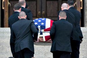 With family members following behind, pallbearers carry the casket of Supreme Court Justice Antonin Scalia through the Holy Door for the Year of Mercy of the Basilica of the National Shrine of the Immaculate Conception on Feb. 20 in Washington.